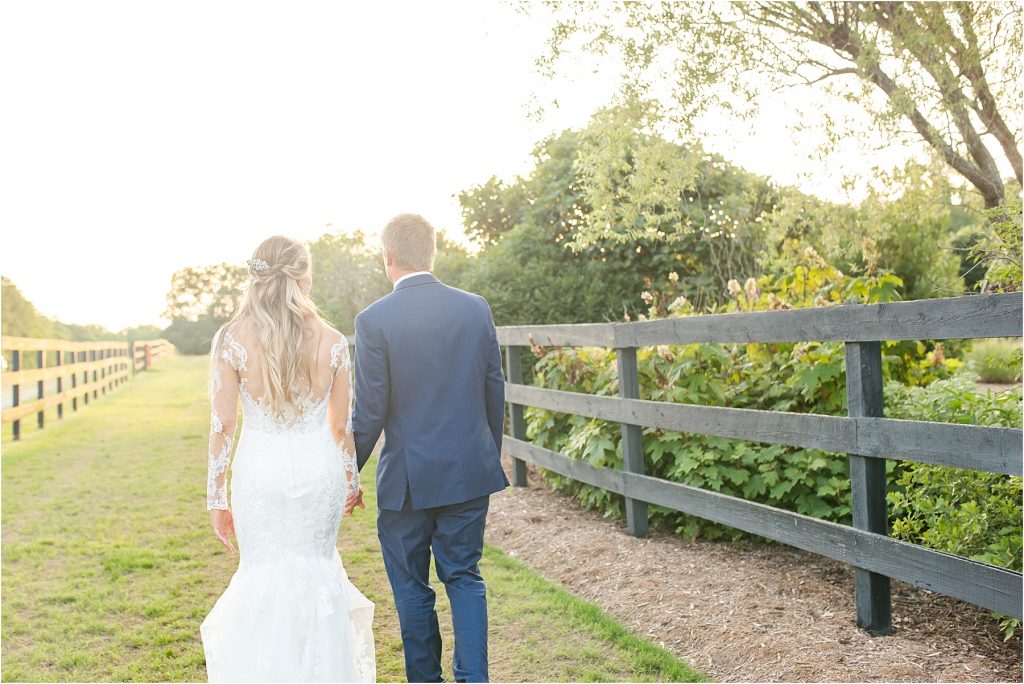 bride and groom at the little herb house