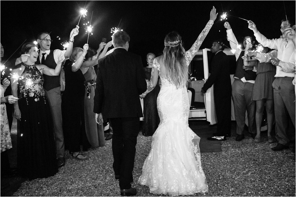 Bride and groom sparkler exit at The Little Herb House Raleigh North Carolina